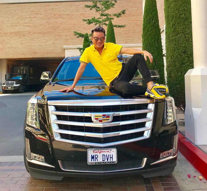 thuc hu viec dam vinh hung tau sieu xe chong dan cadiliac escalade