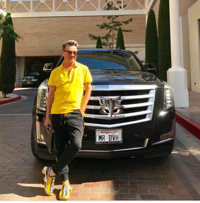 thuc hu viec dam vinh hung tau sieu xe chong dan cadiliac escalade